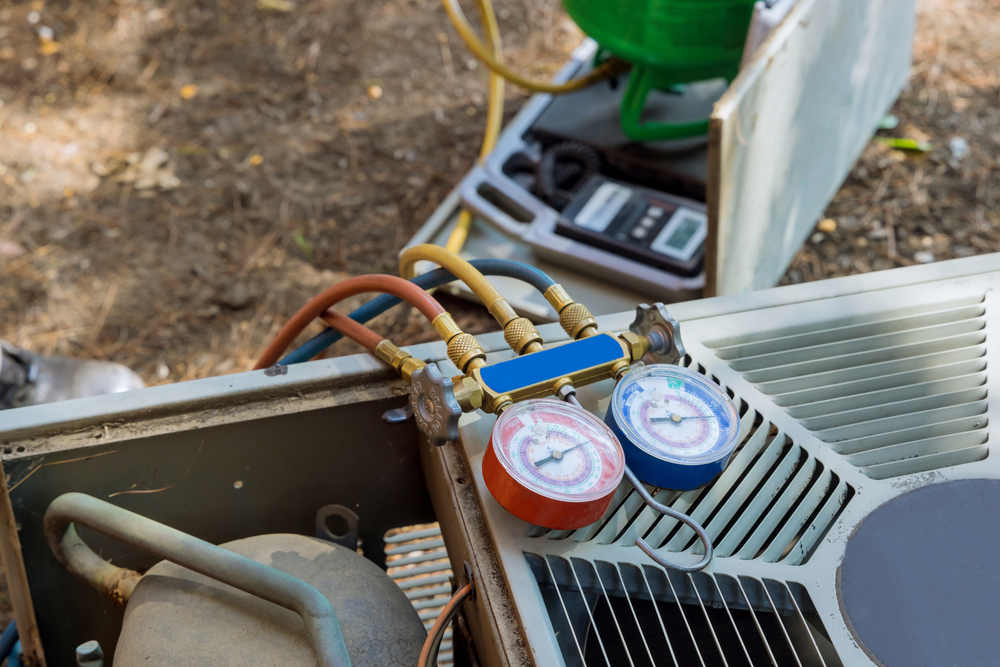 air conditioner being repaired