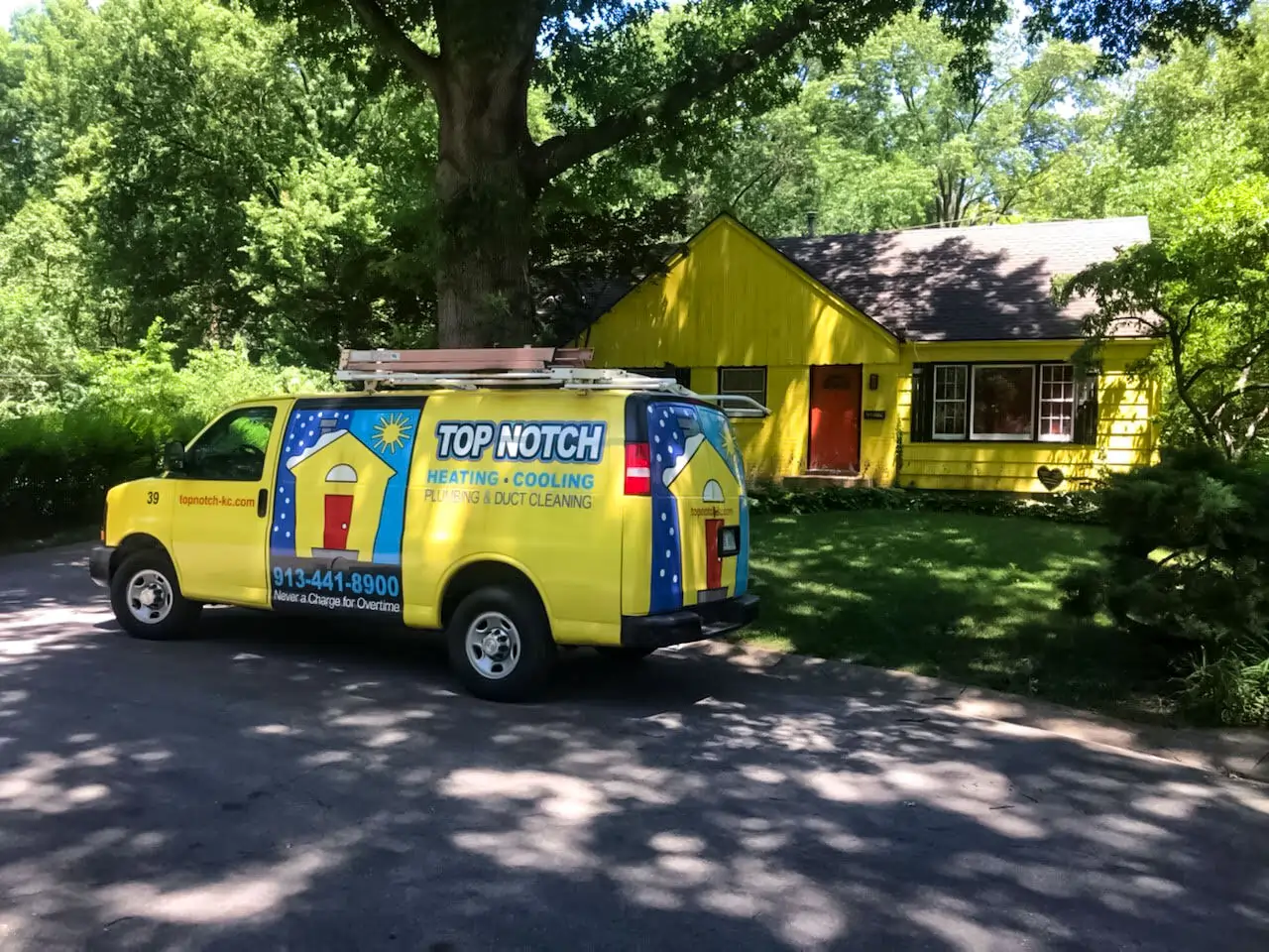 Top-Notch-van-yellow-house Top Notch Heating, Cooling & Plumbing yellow van and house