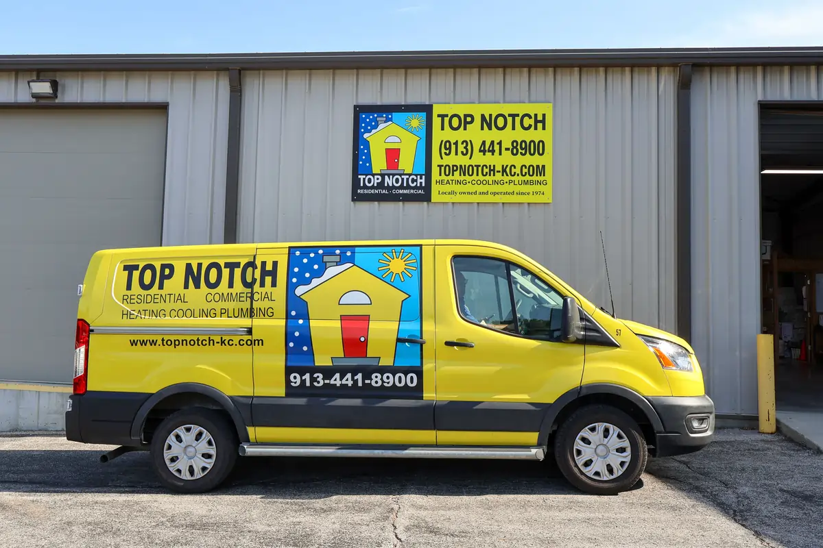 Top Notch Heating, Cooling & Plumbing van and headquarters