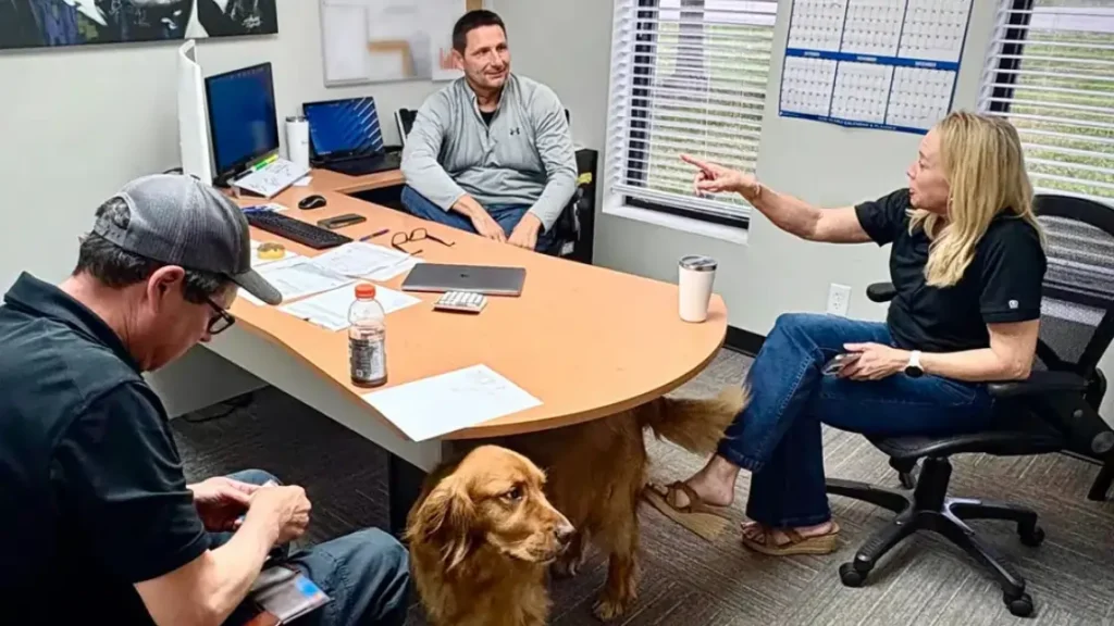 Kim Meyers of Top Notch Heating, Cooling & Plumbing having a meeting with the team.