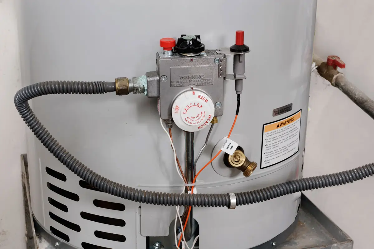 A Shawnee, KS, home water heater prior to being serviced by Top Notch Heating, Cooling & Plumbing.