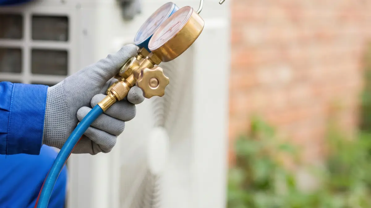 AC technician inspect HVAC Top Notch Heating Cooling and Plumbing